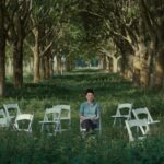 Photo 2 BETWEEN_GOODBYES_KeyStill__M_with_empty_chairs